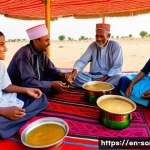 소말리아 전통 명절 - A vibrant Somali festival scene showing a large extended family and clan gathering outdoors during s...